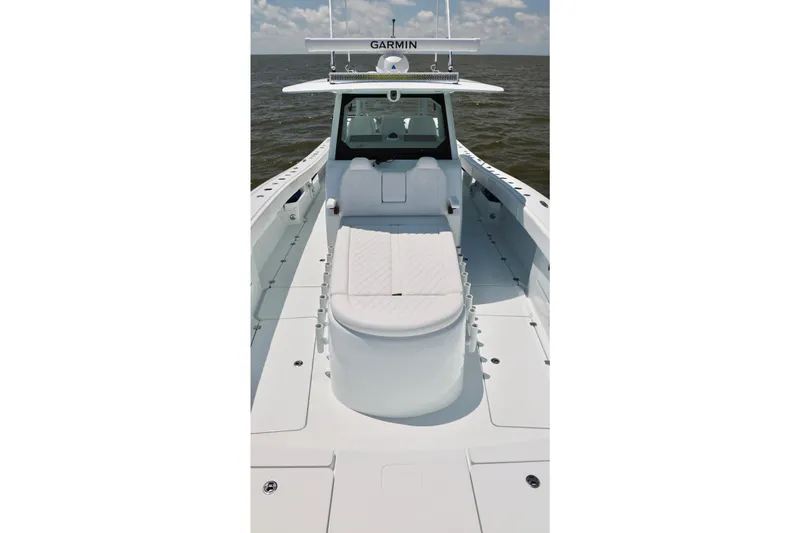 Slide: The Image of 2026 Freeman 43 boat with sleek white deck and Garmin equipment on open water. - 10