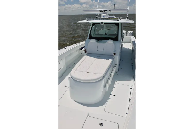 Slide: The Image of 2026 Freeman 43 boat with sleek white deck and Garmin navigation system. - 11