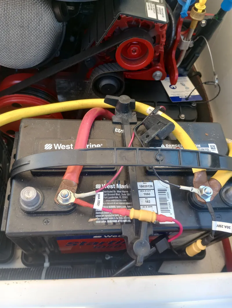 Slide: The Image of Boat battery with cables and connections in the engine compartment. - 42