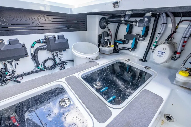 Slide: The Image of 2024 Yellowfin 54 Offshore boat interior with advanced wiring and equipment. - 28