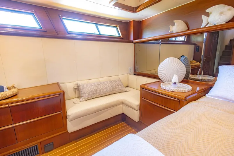 Slide: The Image of Luxurious interior of a 1990 Viking Cockpit Motor Yacht with elegant wood finishes. - 29