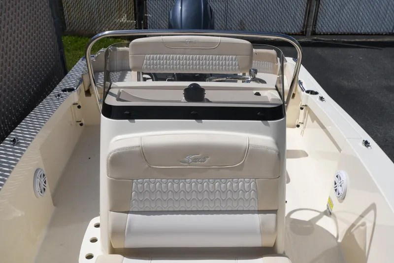 Slide: The Image of 2026 Scout 188 Sportfish boat interior with sleek seating and modern console design. - 5