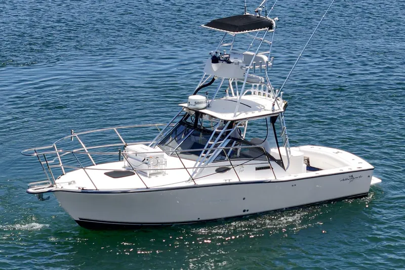 The Image of 1999 Albemarle 290 Express Fisherman boat on clear blue water. - 0