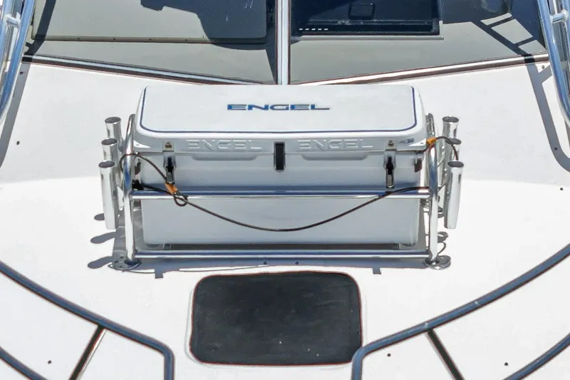 Slide: The Image of 1999 Albemarle 290 Express Fisherman deck with Engel cooler and rod holders. - 16