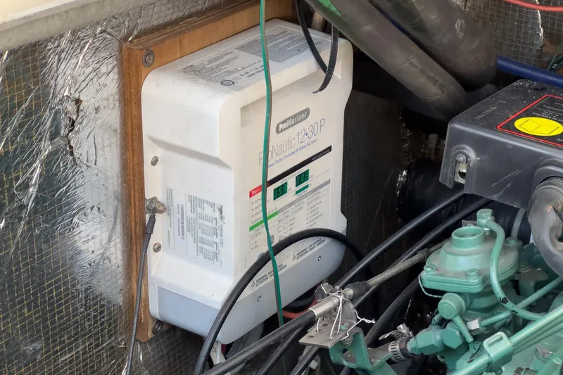 Slide: The Image of Engine compartment of a 1999 Albemarle 290 Express Fisherman with ProMariner charger. - 20