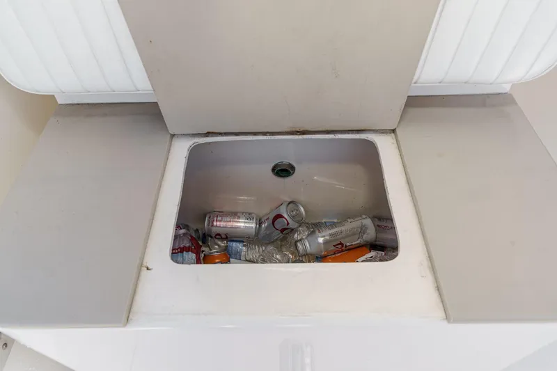 Slide: The Image of Built-in cooler with drinks on a 1999 Albemarle 290 Express Fisherman boat. - 31