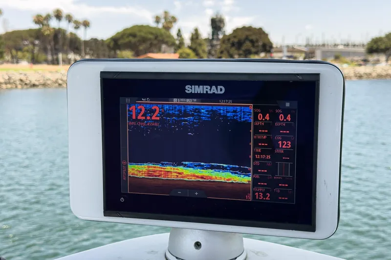 Slide: The Image of Fishfinder display on 1999 Albemarle 290 Express Fisherman, showing depth and sonar data. - 37