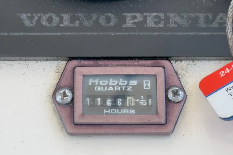 Slide: The Image of Hobbs Quartz hour meter showing 1168 hours on a 1999 Albemarle 290 Express Fisherman. - 64