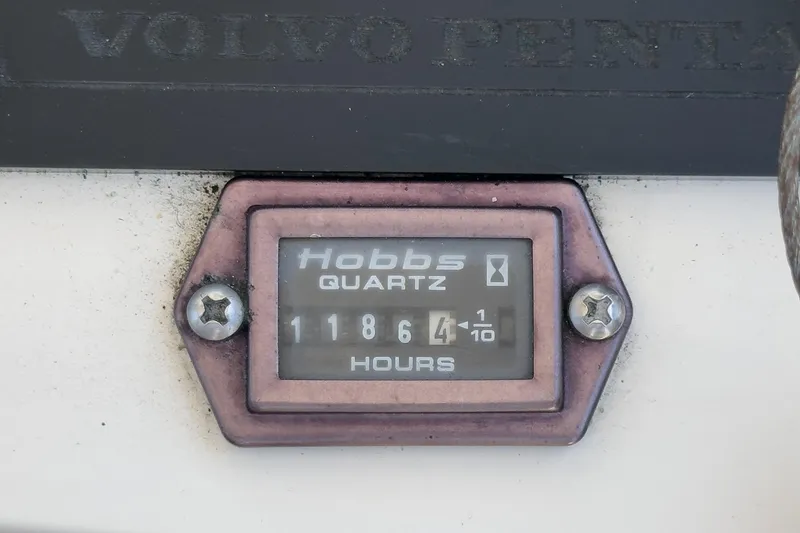 Slide: The Image of Hour meter on 1999 Albemarle 290 Express Fisherman showing 1186.4 hours. - 65
