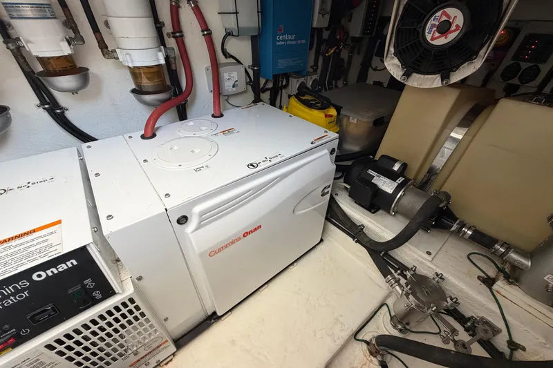 Slide: The Image of Forward engine room of 2015 Riviera 445 SUV with Cummins Onan generator and equipment - 32