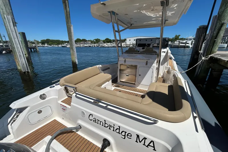 Slide: The Image of 2020 Zar Formenti 85 SL boat docked in Cambridge, MA, with spacious seating and sleek design. - 16