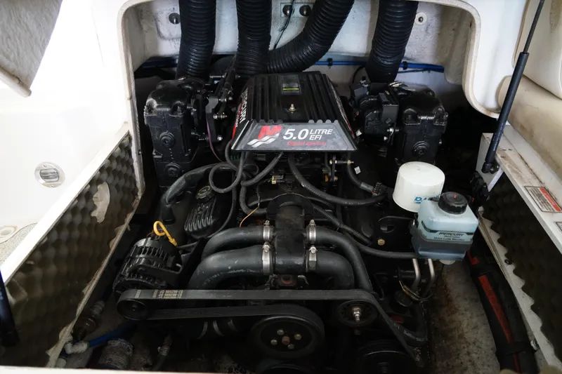 Slide: The Image of Engine compartment of a 2000 Sea Ray 210 Sundeck with 5.0L EFI engine. - 19