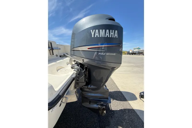 Slide: The Image of Yamaha four-stroke outboard motor on 2007 Pursuit 2570 Offshore boat. - 56