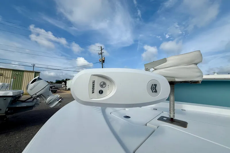 Slide: The Image of 2015 Sportsman Masters 227 Bay Boat with Terrova motor, clear sky background. - 5