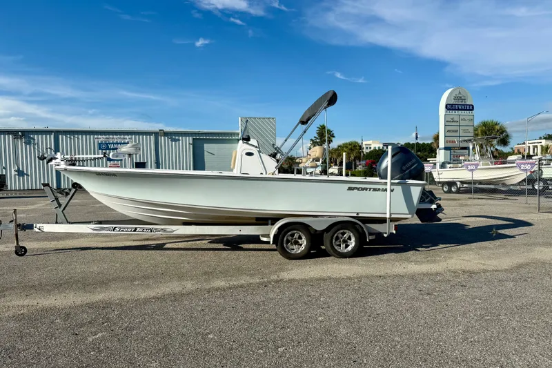 The Image of 2015 Sportsman Masters 227 Bay Boat on trailer at dealership lot. - 0