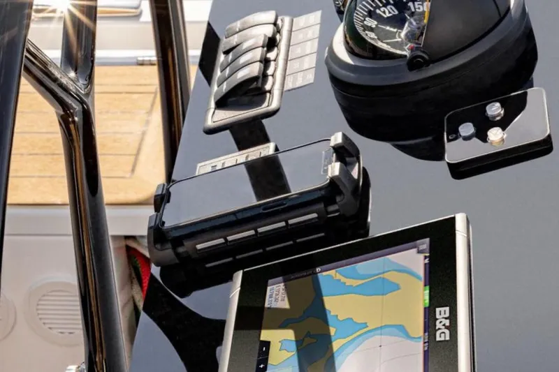 Slide: The Image of Control panel of 2025 Hanse 460 yacht with navigation equipment and compass. - 34