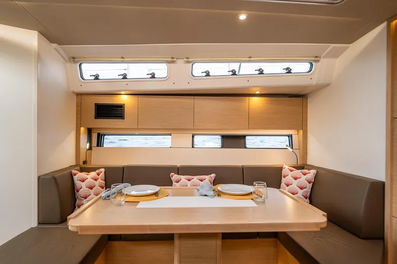 Slide: The Image of Modern interior of 2025 Hanse 460 yacht with elegant dining area and stylish decor. - 16