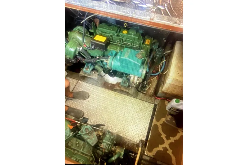 Slide: The Image of Engine room of a 1987 Senator-Chien Hwa Futura Sundeck boat, showcasing mechanical components. - 10