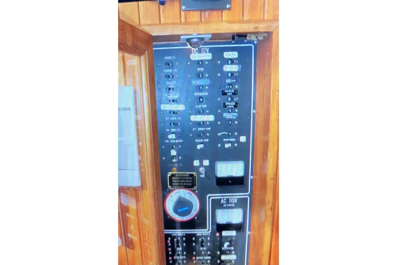 Slide: The Image of Electrical control panel on a 1987 Senator-Chien Hwa Futura Sundeck boat. - 14