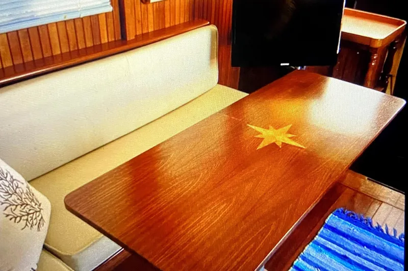Slide: The Image of Elegant wooden table with star inlay on 1987 Senator-Chien Hwa Futura sundeck yacht. - 16