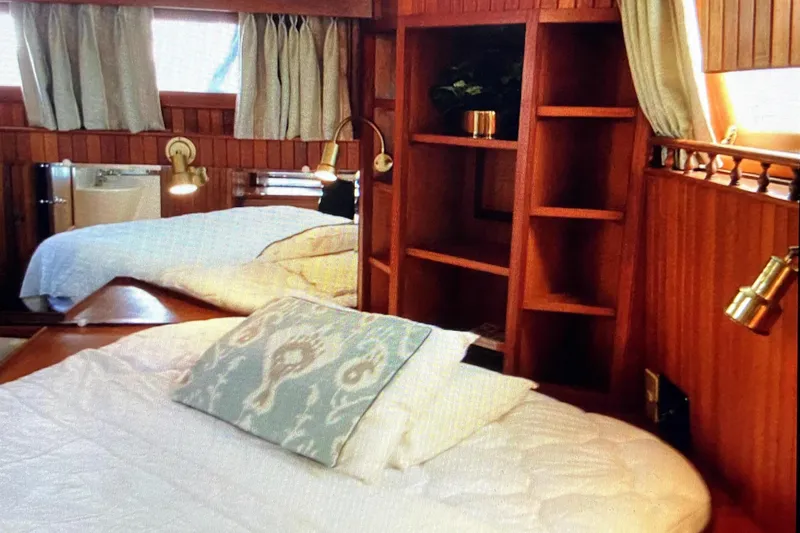 Slide: The Image of Cozy cabin interior of 1987 Senator-Chien Hwa Futura Sundeck yacht with wooden decor. - 18
