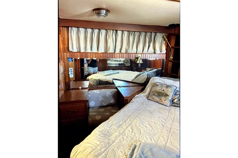 Slide: The Image of Cozy cabin interior of 1987 Senator-Chien Hwa Futura Sundeck with bed and wooden furnishings. - 19