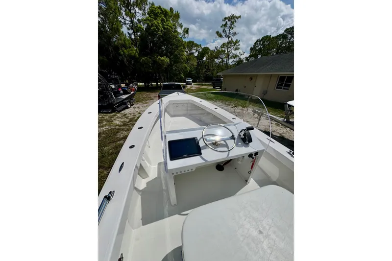 Slide: The Image of 2025 Rambo 22 Center Console boat with sleek design and modern controls. - 3