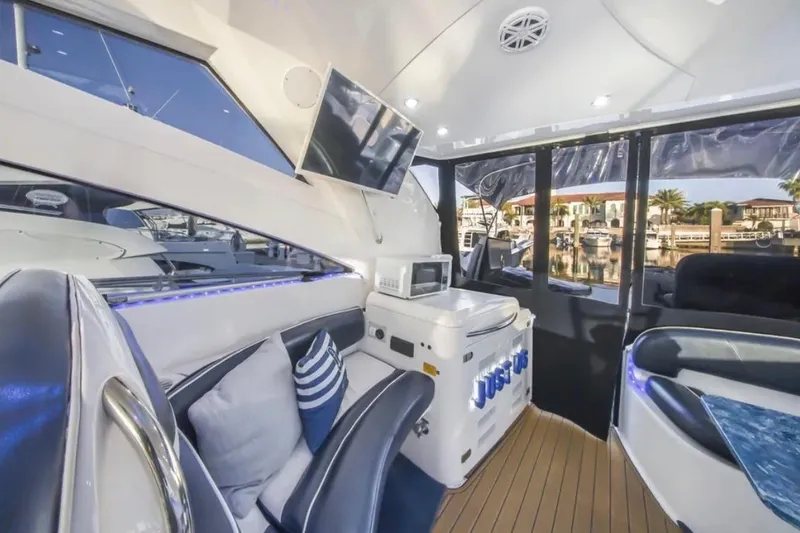 Slide: The Image of Luxurious interior of 2009 Fairline Targa 52 yacht with modern amenities and waterfront view. - 13