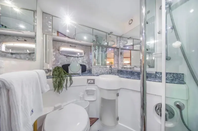 Slide: The Image of Luxurious bathroom interior of 2009 Fairline Targa 52 yacht with modern fixtures and elegant design. - 21