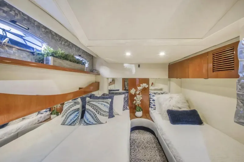 Slide: The Image of Luxurious interior of 2009 Fairline Targa 52 yacht with elegant bedding and decor. - 24