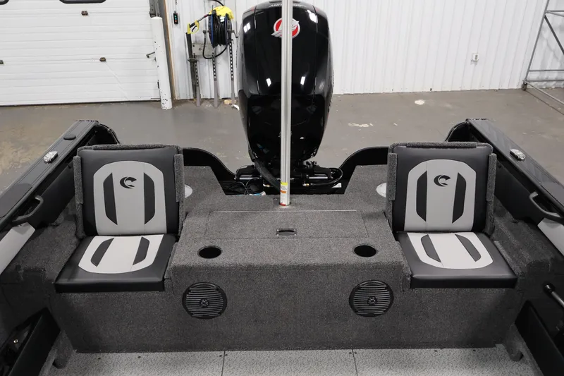 Slide: The Image of 2026 Crestliner 1850 Super Hawk WT JS boat interior with dual seats and motor. - 32