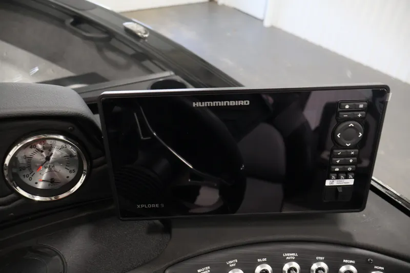 Slide: The Image of Dashboard of 2026 Crestliner 1850 Super Hawk WT JS with Humminbird Xplore 9 display. - 23