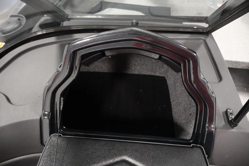 Slide: The Image of 2026 Crestliner 1850 Super Hawk WT JS boat storage compartment with open hatch. - 29