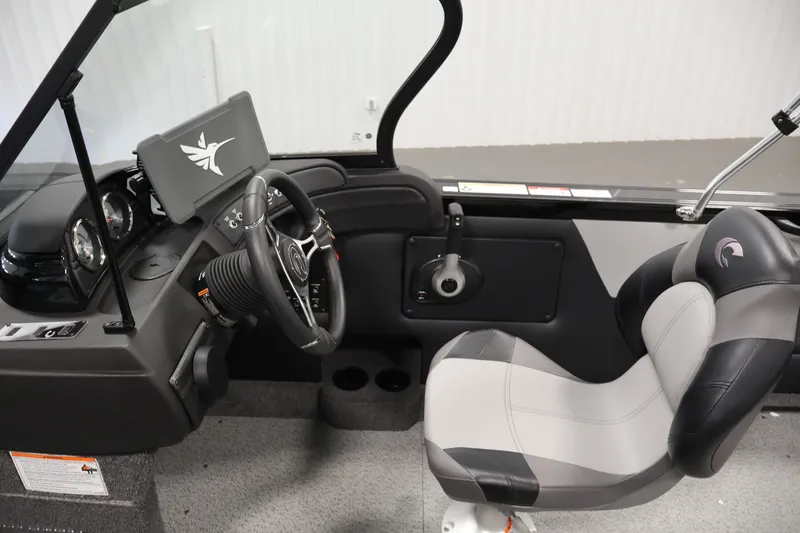 Slide: The Image of 2026 Crestliner 1850 Super Hawk WT JS boat interior with steering wheel and seat. - 18