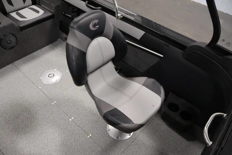 Slide: The Image of 2026 Crestliner 1850 Super Hawk WT JS boat interior with swivel seat and carpeted flooring. - 30