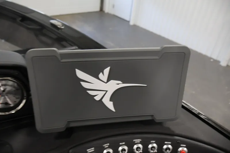 Slide: The Image of Dashboard of 2026 Crestliner 1850 Super Hawk WT JS with logo and controls. - 22