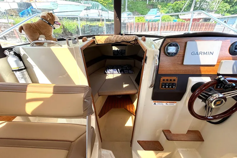 Slide: The Image of Interior of 2021 Ranger Tugs R-25 boat with Garmin navigation system. - 48