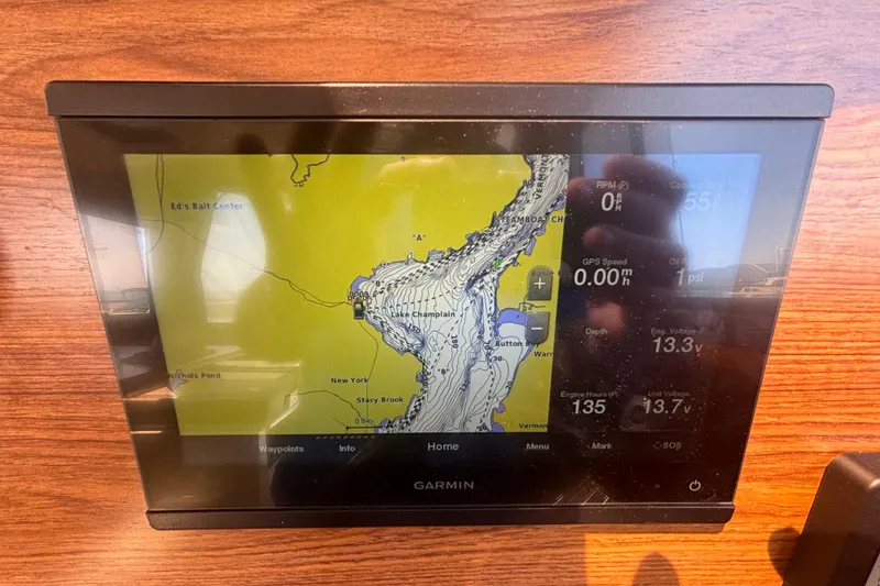 Slide: The Image of Garmin navigation display on 2021 Ranger Tugs R-25 boat dashboard. - 32