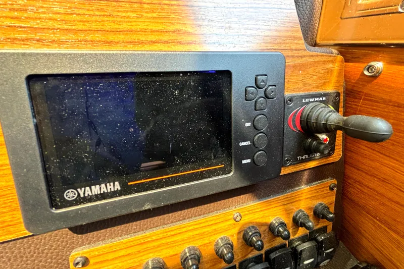 Slide: The Image of Control panel of a 2021 Ranger Tugs R-25 with Yamaha display and Lewmar thruster. - 33