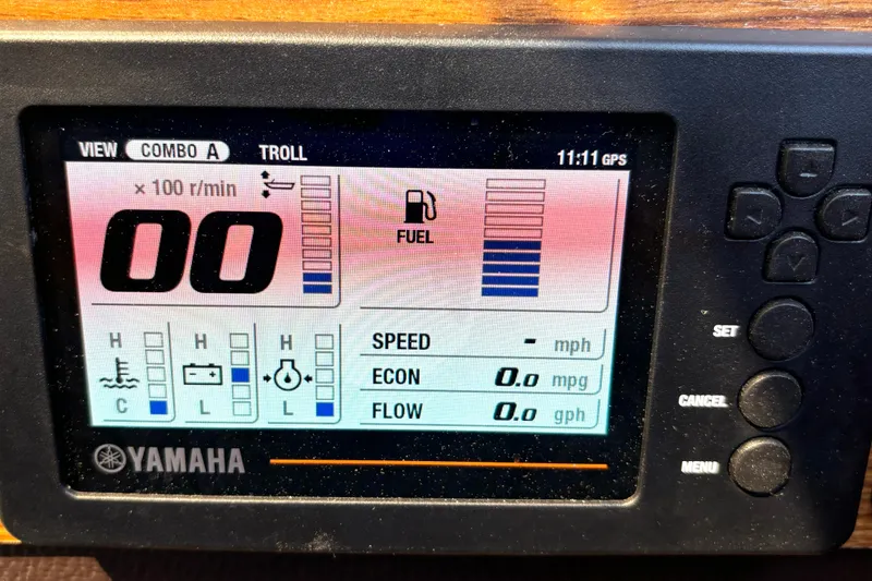 Slide: The Image of Yamaha display panel on 2021 Ranger Tugs R-25 showing engine metrics and fuel levels. - 34