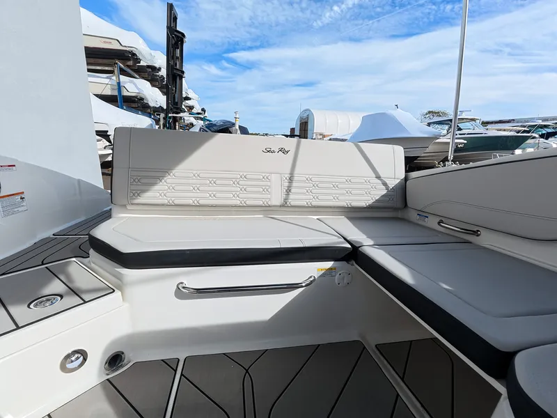 Slide: The Image of Interior view of a Sea Ray SPX 210 Outboard with sleek seating and modern design. - 19