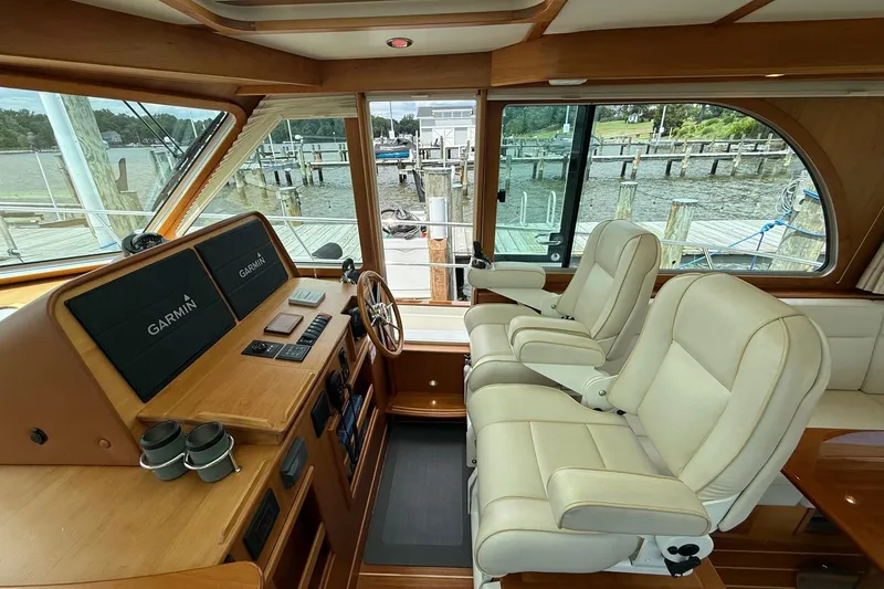 Slide: The Image of 2019 Sabre 45 Salon Express helm with Garmin displays and luxurious seating. - 21
