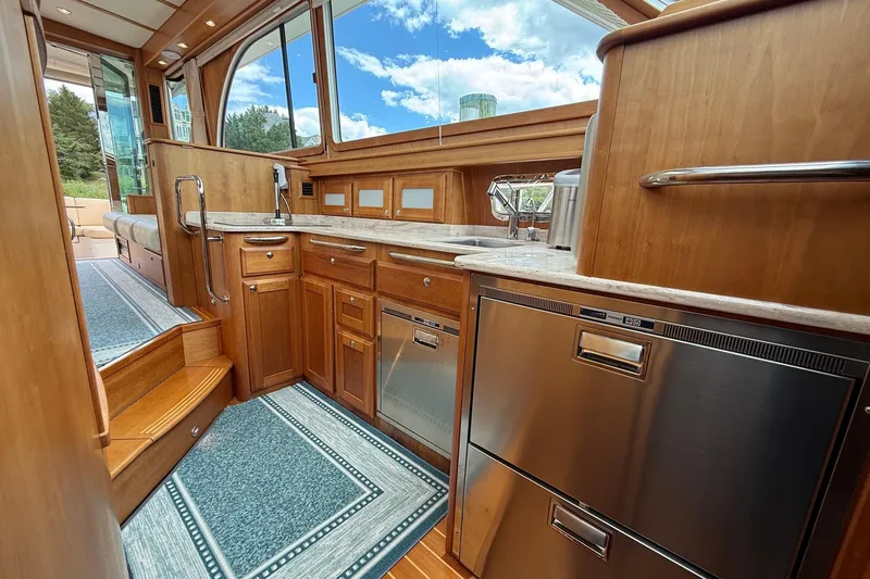 Slide: The Image of Luxurious interior of 2019 Sabre 45 Salon Express yacht with modern kitchen amenities. - 26
