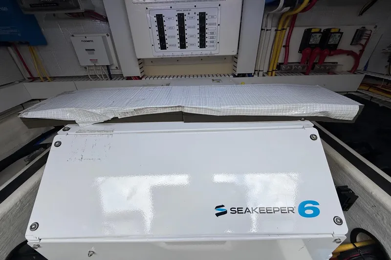Slide: The Image of Engine room of 2019 Sabre 45 Salon Express with Seakeeper 6 stabilizer system. - 37