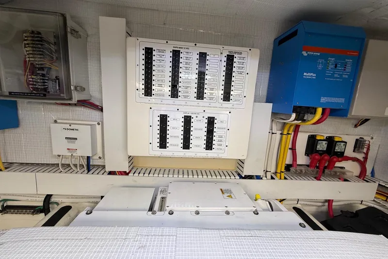 Slide: The Image of Electrical panel and components inside a 2019 Sabre 45 Salon Express yacht. - 38