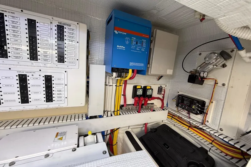 Slide: The Image of Electrical panel and components inside a 2019 Sabre 45 Salon Express yacht. - 39