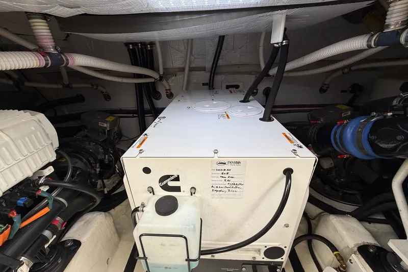 Slide: The Image of Engine room of 2019 Sabre 45 Salon Express with Cummins generator. - 44