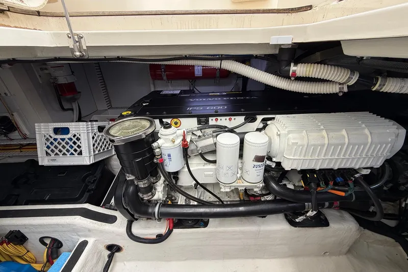 Slide: The Image of Engine compartment of a 2019 Sabre 45 Salon Express yacht, showcasing mechanical components. - 45