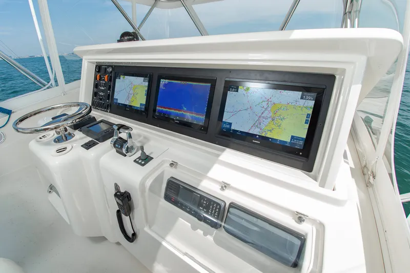 Slide: The Image of Helm of 2008 Bertram 510 Convertible yacht with navigation screens. - 11