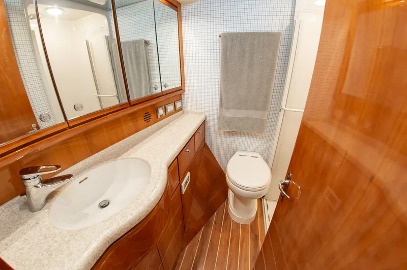 Slide: The Image of Luxurious bathroom on a 2008 Bertram 510 Convertible yacht. - 28